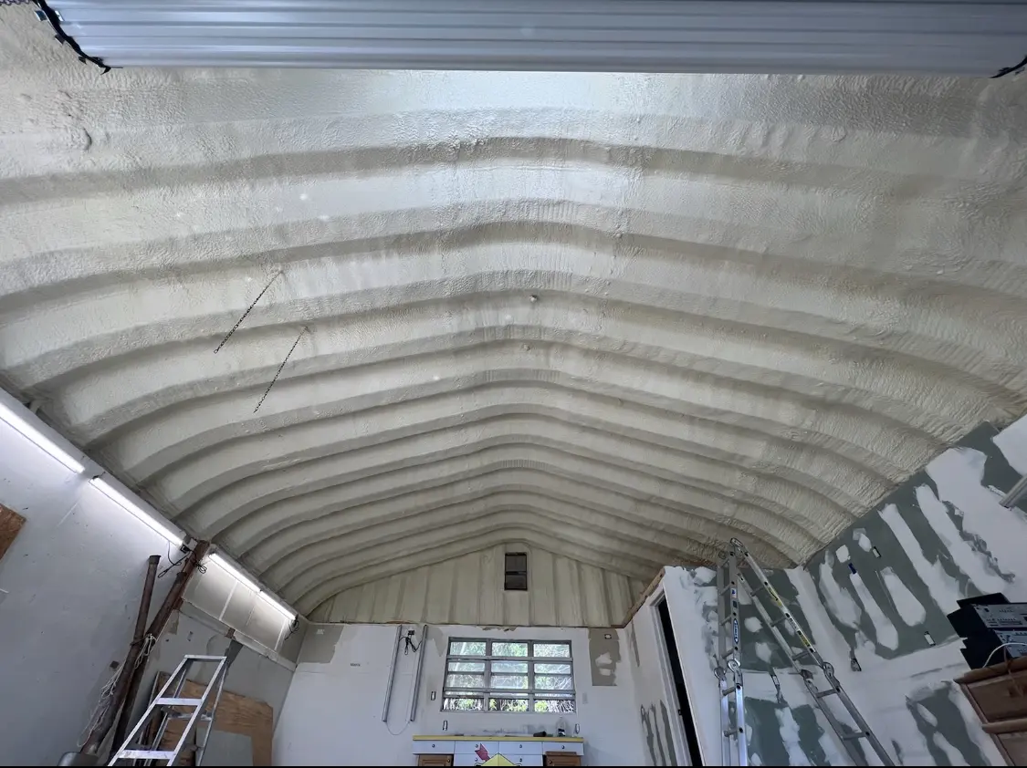 Spray polyurethane foam applied to the underside of a metal roof deck in Somers Point